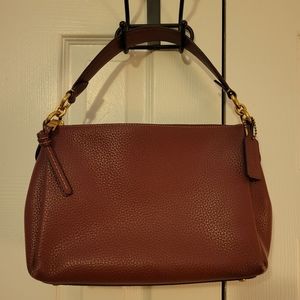 Burgundy Shay Coach purse with gold hardware